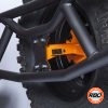 A close up of a UTV rack with Spare tire mounted to cargo rack