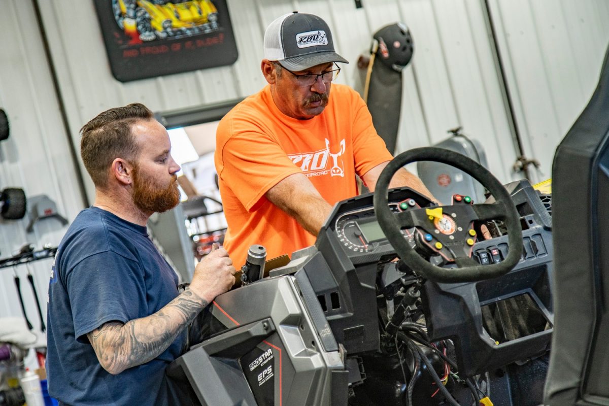 RBO employees working on the Polaris RZR XP Turbo S custom featured vehicle build for SEMA