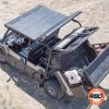 Aerial view of a UTV sitting on top of the sand
