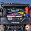 Bed of UTV filled with luggage
