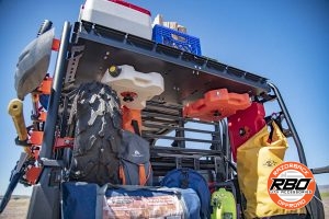 A pile of luggage in a UTV