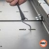 Latching a bungee cord to a utility rack
