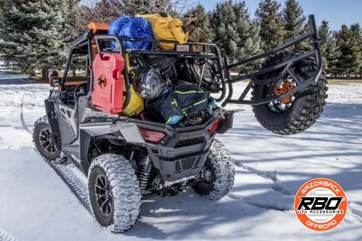 UTV with bed full parked in snow