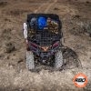 A pile of luggage sitting on top of a UTV