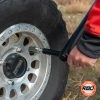 Built in socket drive to change tire with shovel handle