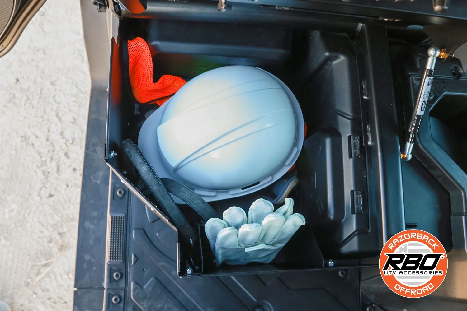 Ranger XD 1500 Underseat Storage side view with fill contents and pocket